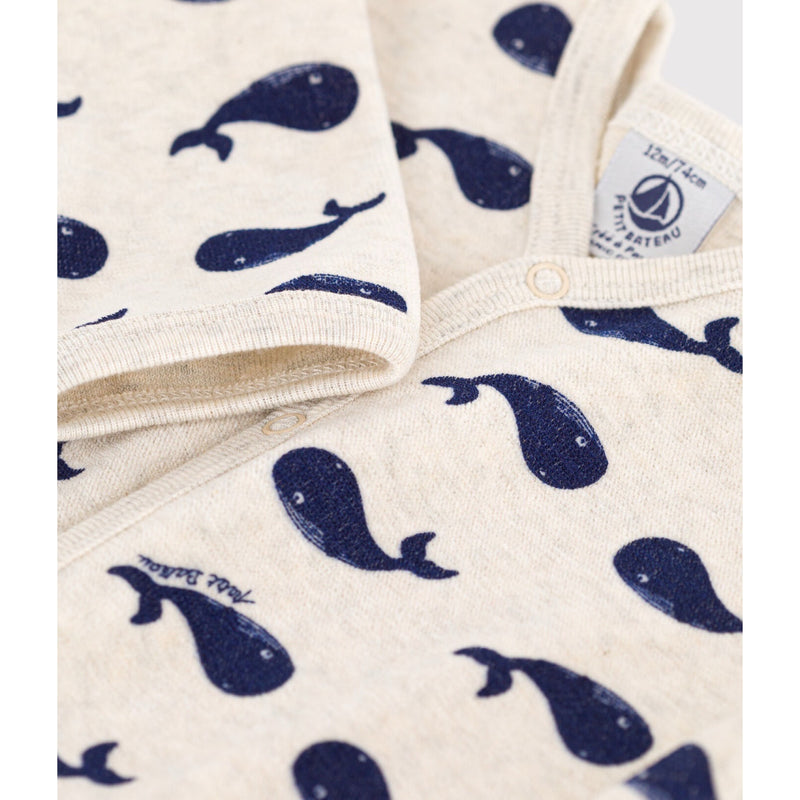 Navy whale patterned velour sleepsuit