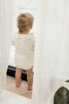 Ruffled onesie long sleeves