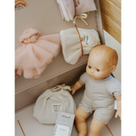 Ma valise « Kit Naissance » deluxe en tricot rose avec bébé Clarisse